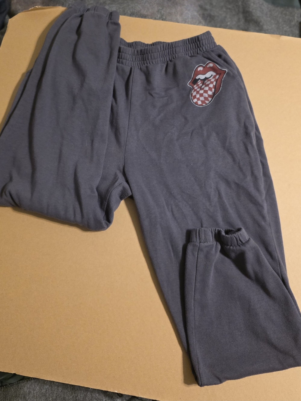 the Rolling Stones Men's Charcoal Sweatpants with Checker Tongue Logo